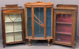 THREE VINTAGE CHINA DISPLAY CABINETS to include a single door oak example with railback and interior