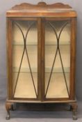 VINTAGE MAHOGANY TWO DOOR RAILBACK CHINA DISPLAY CABINET - with interior glass shelves, on ball