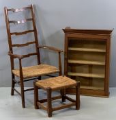 STRUNG SEATED ELBOW CHAIR with ladderback, 100cms H, 58cms W, 38cms D and a similar footstool, 30cms