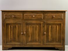 LINENFOLD SIDEBOARD BASE with three drawers over three base cupboards, 84cms H, 136cms W, 40cms D
