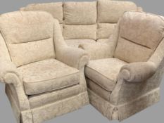 THREE PIECE LOUNGE SUITE in beige floral upholstery, 96cms H, 215cms W, 93cms D (the sofa) and