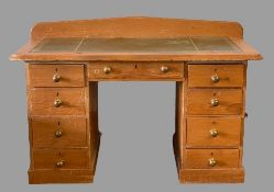 ANTIQUE PINE TWIN PEDESTAL DESK with tooled leather effect top, railback and a central drawer, 93cms