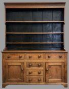 NORTH WALES DRESSER having a three shelf rack over a T-Bank of three over three drawers and two side