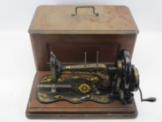 ANTIQUE SINGER HAND CRANK SEWING MACHINE - in slide-out case