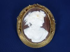 VICTORIAN & LATER JEWELLERY, 2 ITEMS - a cased pinchbeck framed cameo brooch, 15 x 4.5cms (AF) and