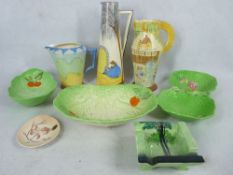 ART DECO POTTERY GROUP including a Flaxman ware, and other hand painted jugs, Carltonware Beswick