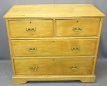 CIRCA 1900 OAK CHEST OF TWO SHORT OVER TWO LONG DRAWERS - having brass backplates and swing handles,