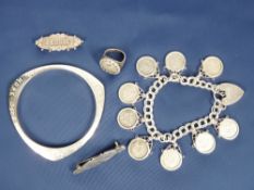 SILVER & WHITE METAL JEWELLERY, 5 ITEMS to include a padlock clasp charm bracelet holding 9 frame