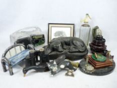 HEAVY COMPOSITION MODEL OF A SLEEPING HOUND - on a base, 40cms L, a mineral desk stand and an