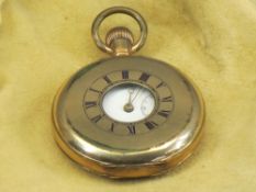 A DENNISON STAR ROLLED GOLD HALF HUNTER POCKET WATCH - with white enamel dial, Roman numerals and