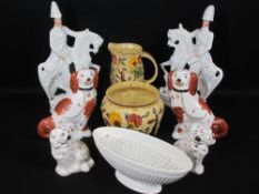STAFFORDSHIRE DOGS, two pairs, 24cms H the tallest, a pair of Staffordshire flatback horse and rider