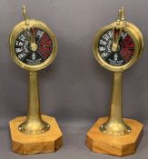 VINTAGE BRASS ENGINE ROOM TELEGRAPH LAMPS on wooden block bases, 55cms H, 18cms drum diameters