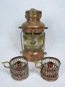 COPPER SHIP'S LAMP marked 'Anchor', 30cms H and a pair of pierced copper candleholders, stamped to
