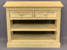 MODERN LIMED OAK TWO DRAWER, TWO SHELF SIDE STAND - with X frame side detail on a plinth base, 77cms
