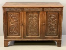 ANTIQUE CARVED OAK TWO DOOR SIDEBOARD (ex-coffer), the moulded edge top over a central panel and