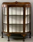 ORNATE CHINA CABINET - antique mahogany with shaped front, rail back and on ball and claw feet,