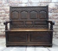ANTIQUE JOINED OAK BOX SETTLE, panelled back and front profusely carved with foliage, lift up