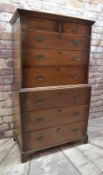 LATE GEORGIAN OAK TALLBOY CHEST, shallow cornice above arrangement of eight drawers, raised on