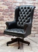 NORWEGIAN LEATHER DESK CHAIR, button upholstered in black with swivel base Condition: arms and