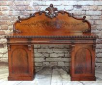 LATE VICTORIAN WALNUT PEDESTAL SIDEBOARD, scrolled back above ripple moulded top and three cushion