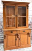 LATE VICTORIAN GOLDEN OAK BOOKCASE, ogee cornice and corbelled uprights, glazed door enclosing
