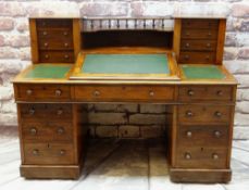 VICTORIAN MAHOGANY PEDESTAL DESK, angled fall between shelved superstructure and gallery, above twin