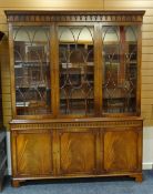 'REPRODUX' MAHOGANY BOOKCASE, arcaded dentil cornice, astragal doors, adjustable shelves, cupboard