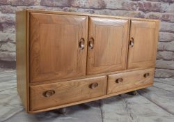 ERCOL 'WINDSOR 468' BLONDE ELM SIDEBOARD, fitted three cupboards over pair apron drawers, casters,