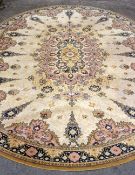 LOUIS DE POORTERE OVAL ORIENTAL-STYLE RUG, with central medallion and border of pendant palmettes