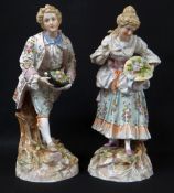 PAIR LARGE VOLKSTEDT PORCELAIN FIGURES, of Georgian rustics gathering flowers in their hats, on