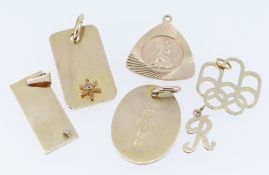 ASSORTED PENDANTS comprising five 9ct gold pendant, two set with tiny diamonds, together with a