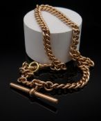 9CT GOLD ALBERT WATCH CHAIN, curb link with T-bar, 36.5cms long, 39.9gms