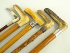 FOUR VINTAGE WALKING STICKS & A RIDING CROP, including crutch-handled stick with silver collar