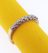 18CT GOLD EIGHT-STONE DIAMOND RING, in half eternity design, 0.22cts overall approx., ring size R,