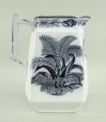A LLANELLY POTTERY FERN TRANSFER JUG WITH DEDICATION inscribed 'John Caul, Llanelly 1888', 18cms