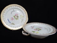 A PAIR OF SWANSEA EARTHENWARE FOOD WARMERS circular form, twin handles, painted to match a porcelain