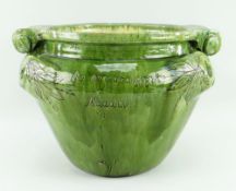 A SUBSTANTIAL LATE 19TH CENTURY EWENNY SLIPWARE POTTERY JARDINIERE BY EVAN JONES with complex scroll