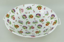 SWANSEA PORCELAIN TWIN-HANDLED BASIN IN THE MARINO BALLROOM SET PATTERN circa 1815-17, naively