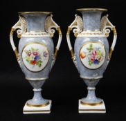 A PAIR OF SWANSEA PORCELAIN VASES circa 1814-1818, of ovoid form over a circular feet on square