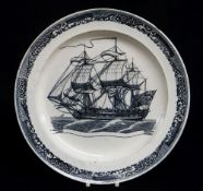 A CAMBRIAN SWANSEA PEARLWARE SHIP PLATE circa 1800, transfer decorated in ink-blue with a brig in
