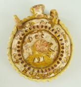 AN 1898 PRIMITIVE WELSH SLIPWARE FLASK OR COSTREL of circular form bearing inscription 'Drink
