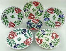 SIX LLANELLY POTTERY 'PERSIAN ROSE' PATTERN PLATES, 4 x 25cms diam, 1 x 27cms diam, 1 x 20cms (bowl)