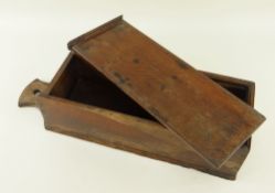 19TH CENTURY OAK CANDLE BOX with sliding cover and hanging handle, 46cms high Provenance: private