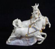 MEISSEN PORCELAIN FIGURE GROUP, early 20th Century, of galloping horses amongst clouds wearing