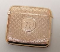 GEORGE V 9CT GOLD VESTA CASE, overall engine turned with engraved initials, Birmingham 1925, 25.0gms