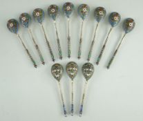 TWO SETS RUSSIAN ENAMEL & SILVER GILT TEASPOONS, 1908-1917, one a set of nine with makers mark 'EO',