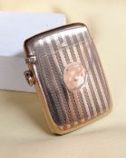 GEORGE VI 9CT GOLD VESTA CASE of slightly curved rectangular form, engine turned with circular