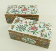 PAIR CHINESE CANTON FAMILLE ROSE DESK BOXES, 19th Century, rectangular tops decorated with long-