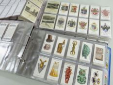 TWO ALBUMS OF PRE WAR CIGARETTE CARDS, collections including Lamberts Football Clubs and badges,