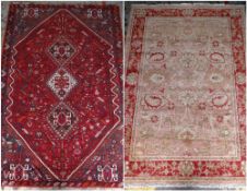 TWO RUGS, including Qashqai with triple joined lozenges to the hexagonal red floral field, blue-grey